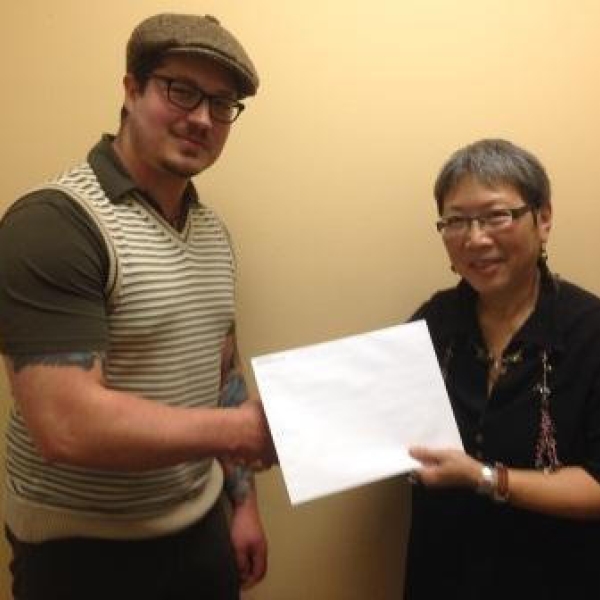 Anthropology Club Award recipient Jaden receiving his award package from Dr Imogene Lim, Chair. April 9, 2014.