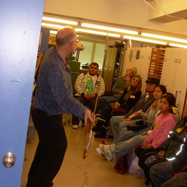 Look out! Grant Keddie from the Royal BC Museum demonstrates the use of an atlatl to students of ANTH 121 (Aboriginal Peoples and Cultures in Canada).