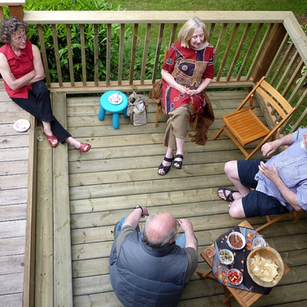 Gay, Inge, Gary, and Ron deep in conversation.