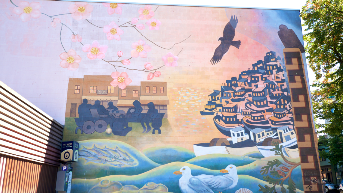 Joey Mallett and Rita Buchwitz’s Celebrating Community (2011) mural on Powell Street, Vancouver, BC. Photo credit: Raymond Kam, 2017.