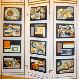 Carra Christy, Spirals of Change, 12 acrylic paintings on stretched canvas hung from a metal frame..