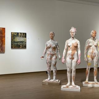 Image of female form sculptures in art exhibiton